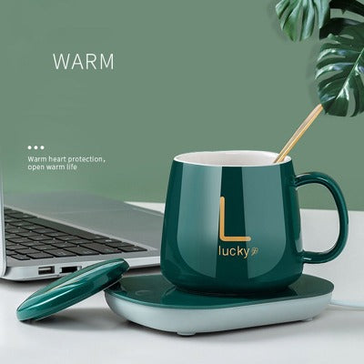 Electric USB Coffee Mug Warmer on desk - Emirex UAE